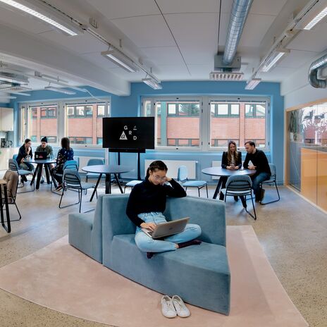 Office and common spaces in A Grid